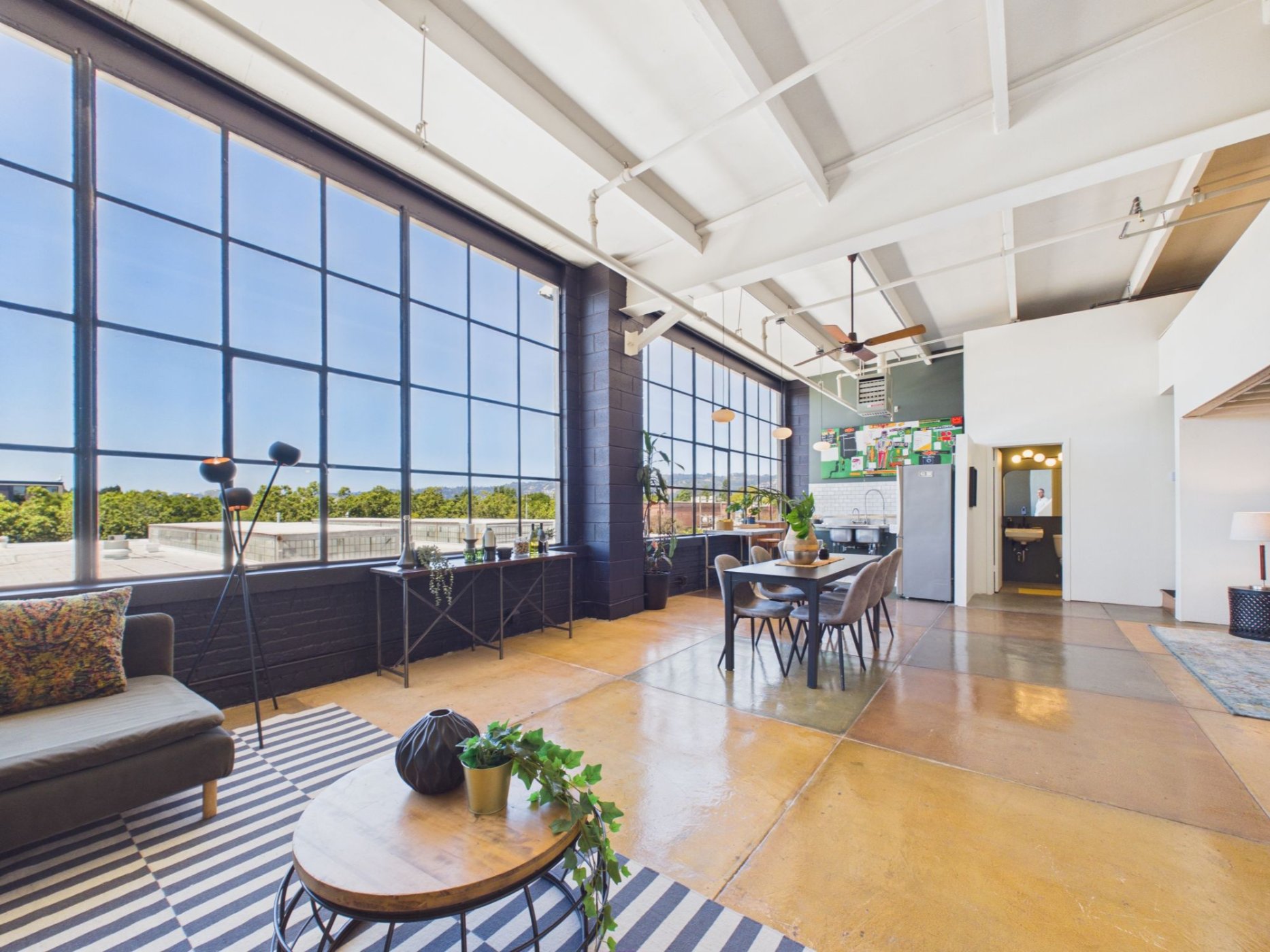 4053 Harlan St #315, Emeryville - top floor loft with massive floor-to-ceiling windows and views of the Berkeley Hills—Andy Read Realtor—Photo 7