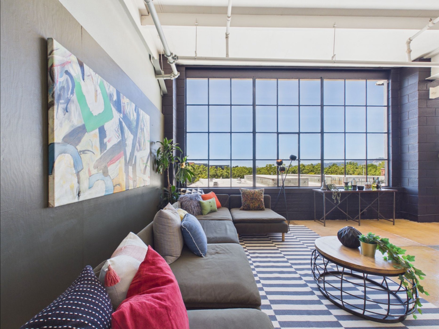  4053 Harlan St #315, Emeryville - top floor loft with massive floor-to-ceiling windows and views of the Berkeley Hills—Andy Read Realtor—Photo 4