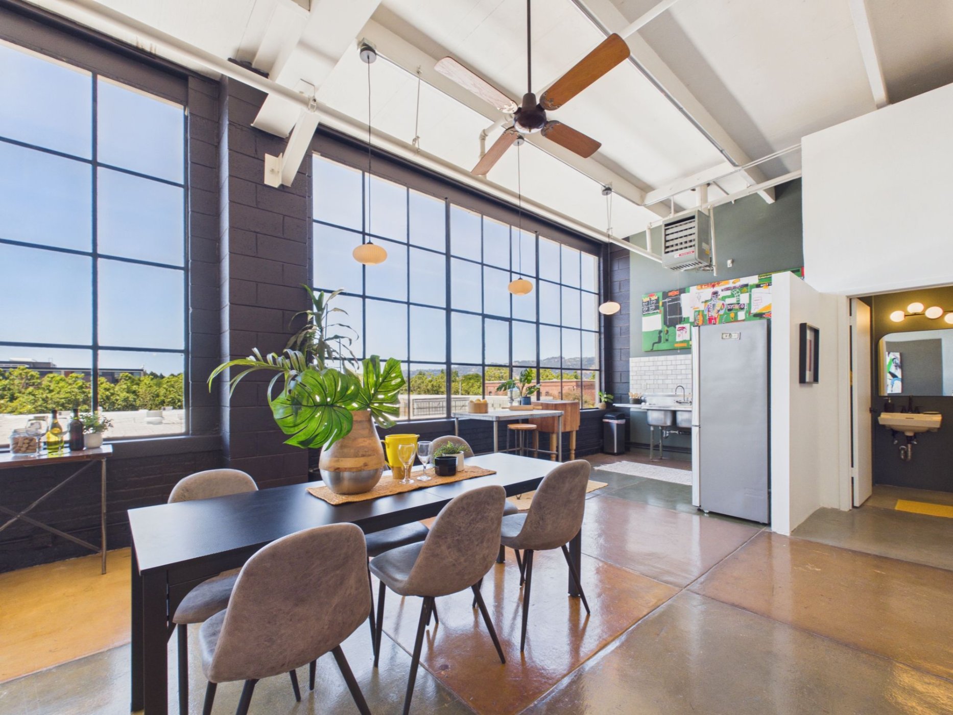  4053 Harlan St #315, Emeryville - top floor loft with massive floor-to-ceiling windows and views of the Berkeley Hills—Andy Read Realtor—Photo 2