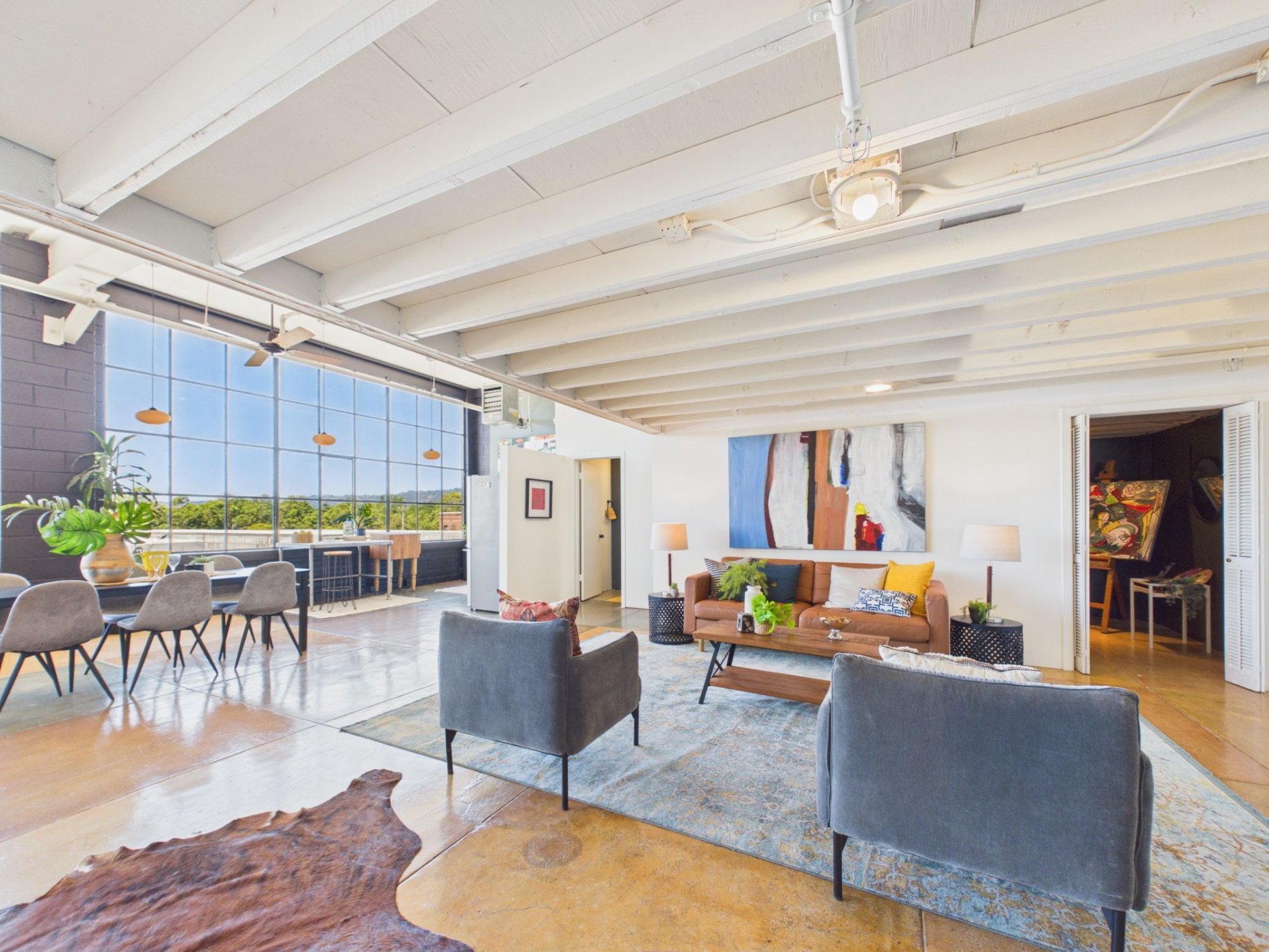  4053 Harlan St #315, Emeryville - top floor loft with massive floor-to-ceiling windows and views of the Berkeley Hills—Andy Read Realtor—Photo 6